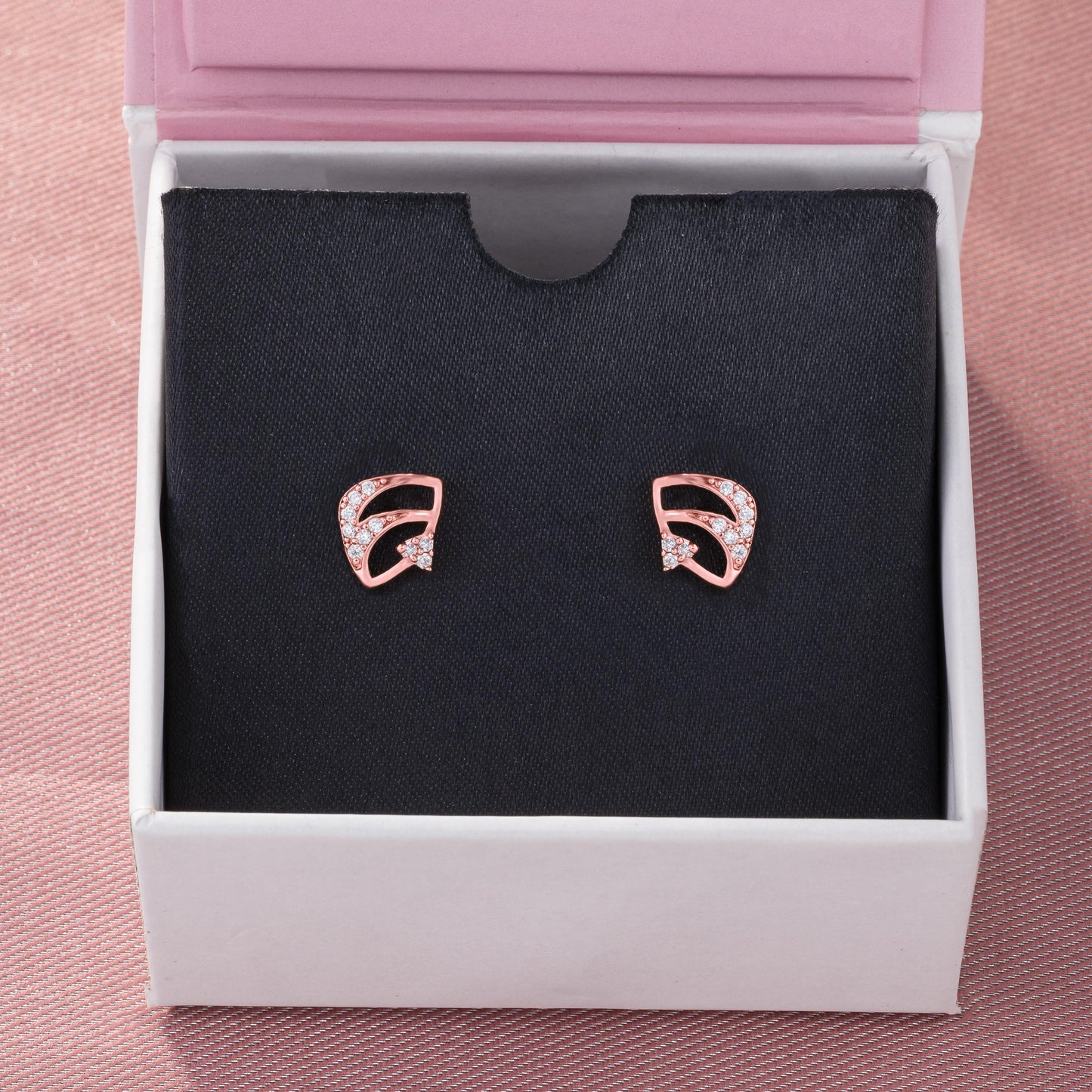 pair of elegant rose gold earrings adorned with sparkling diamonds