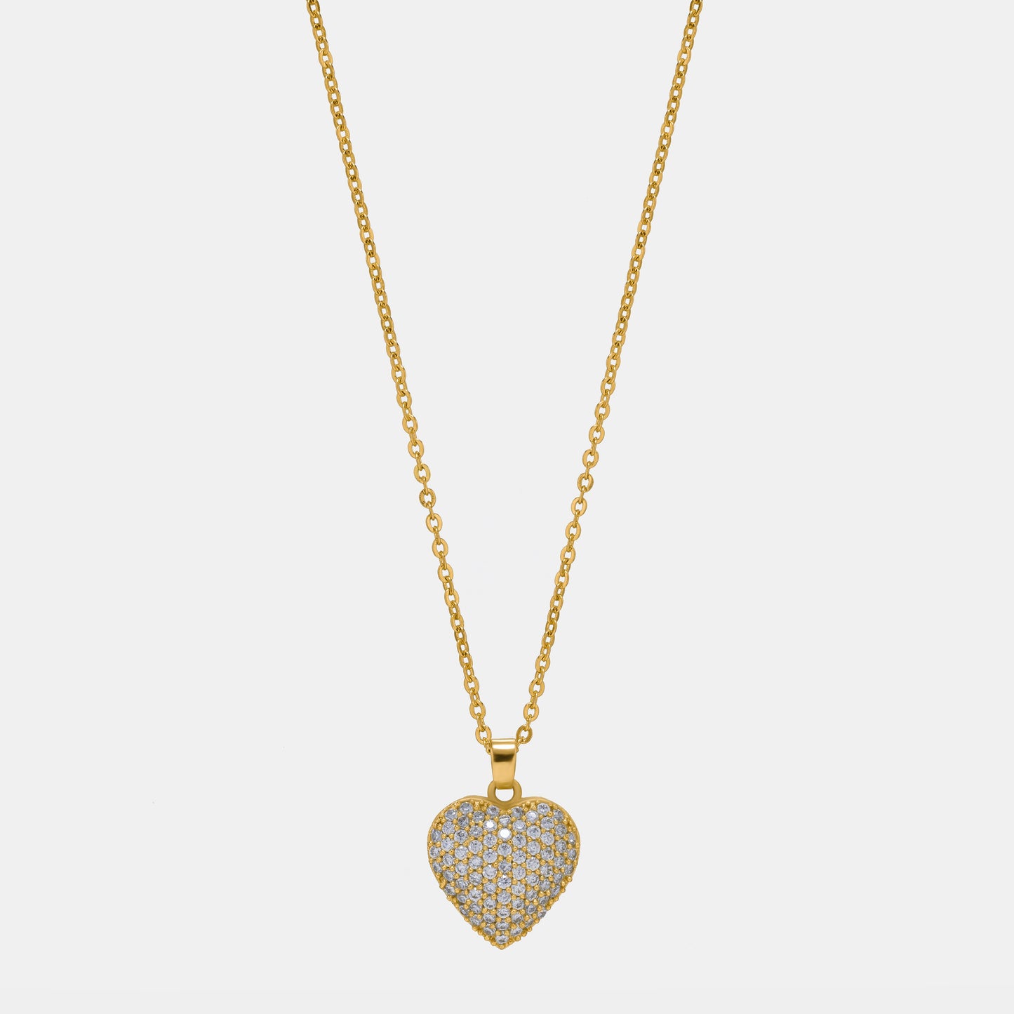 golden necklace with a heart pendant