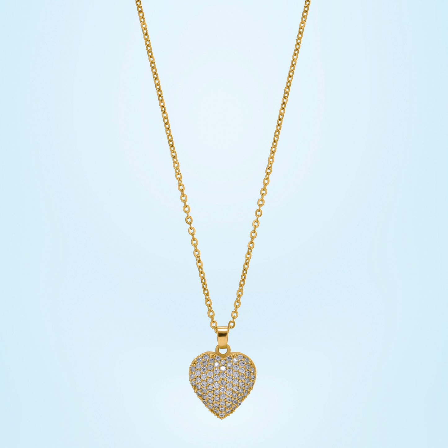 golden necklace with a heart pendant