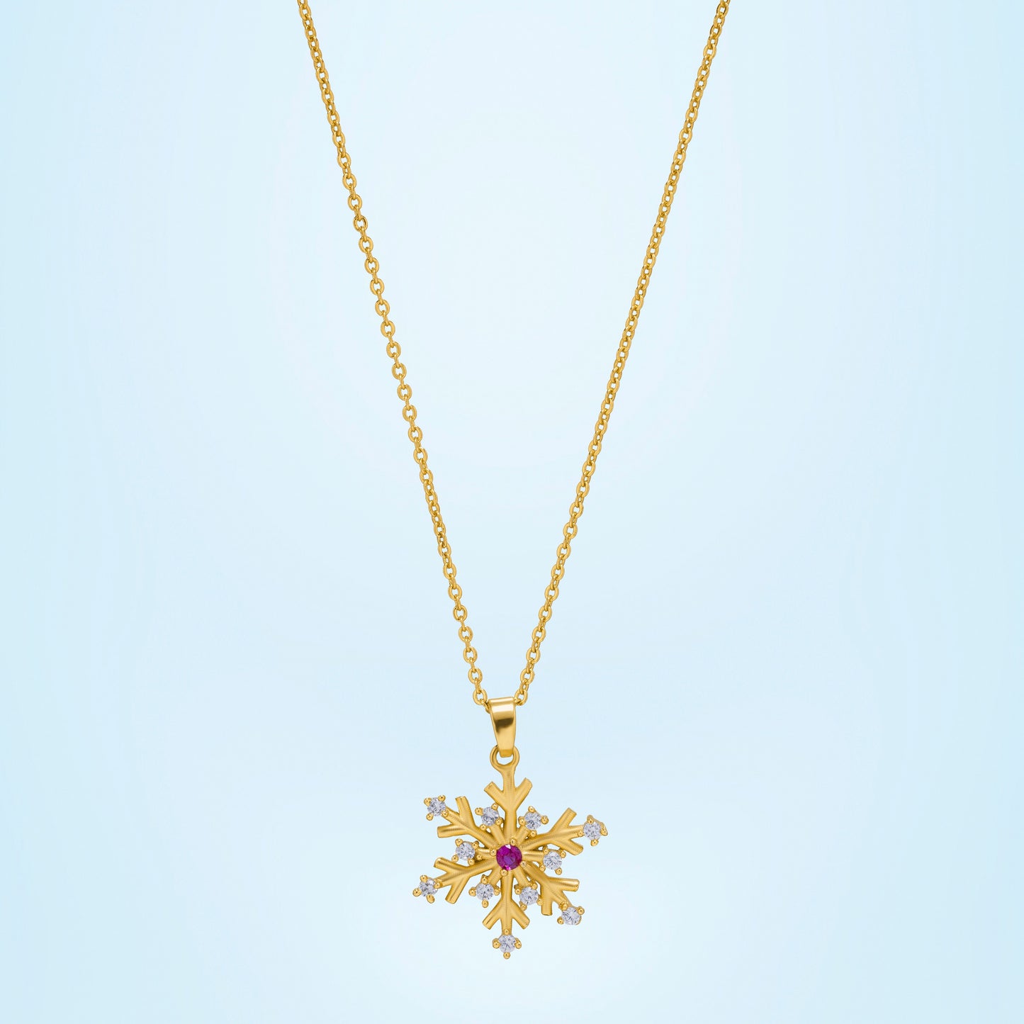 golden necklace with a flower charm