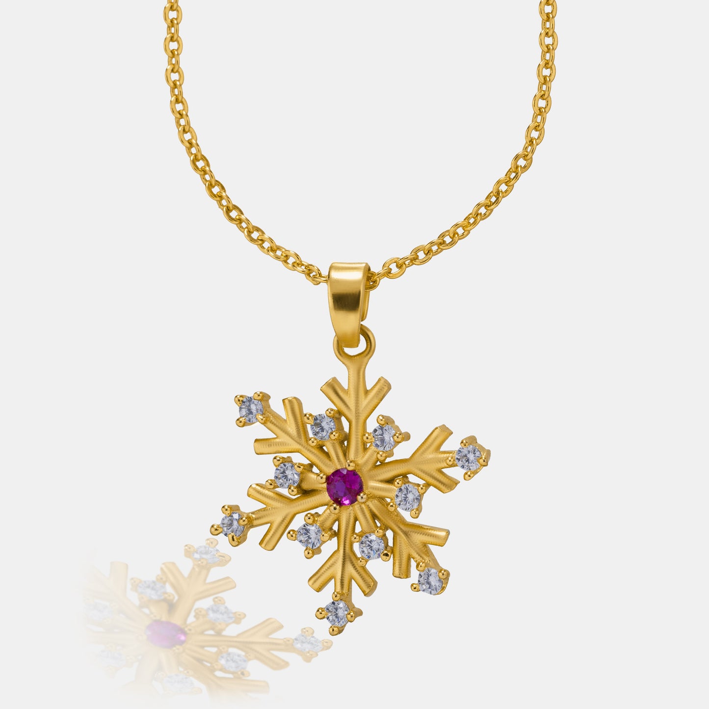 golden necklace with a flower charm