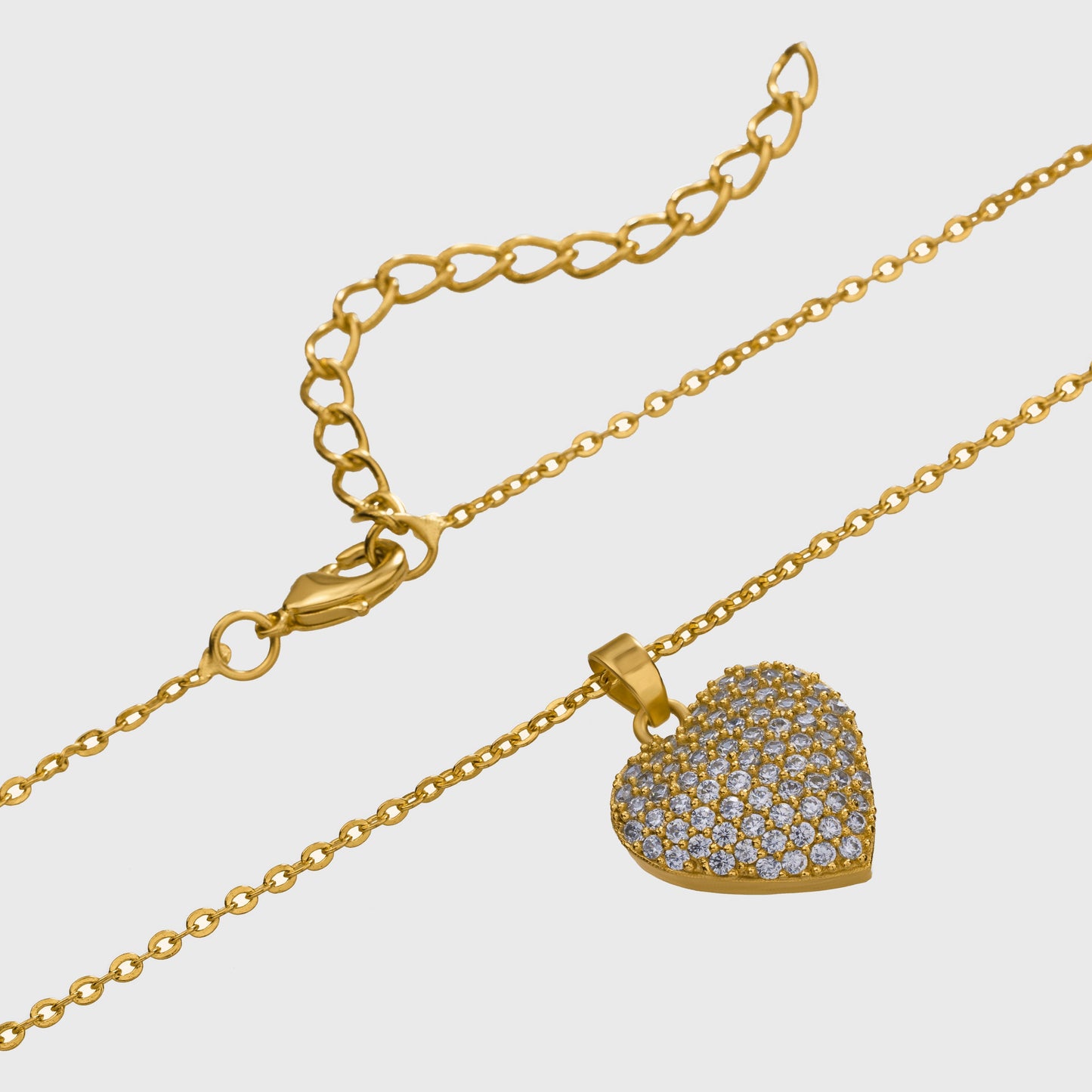 golden necklace with a heart pendant