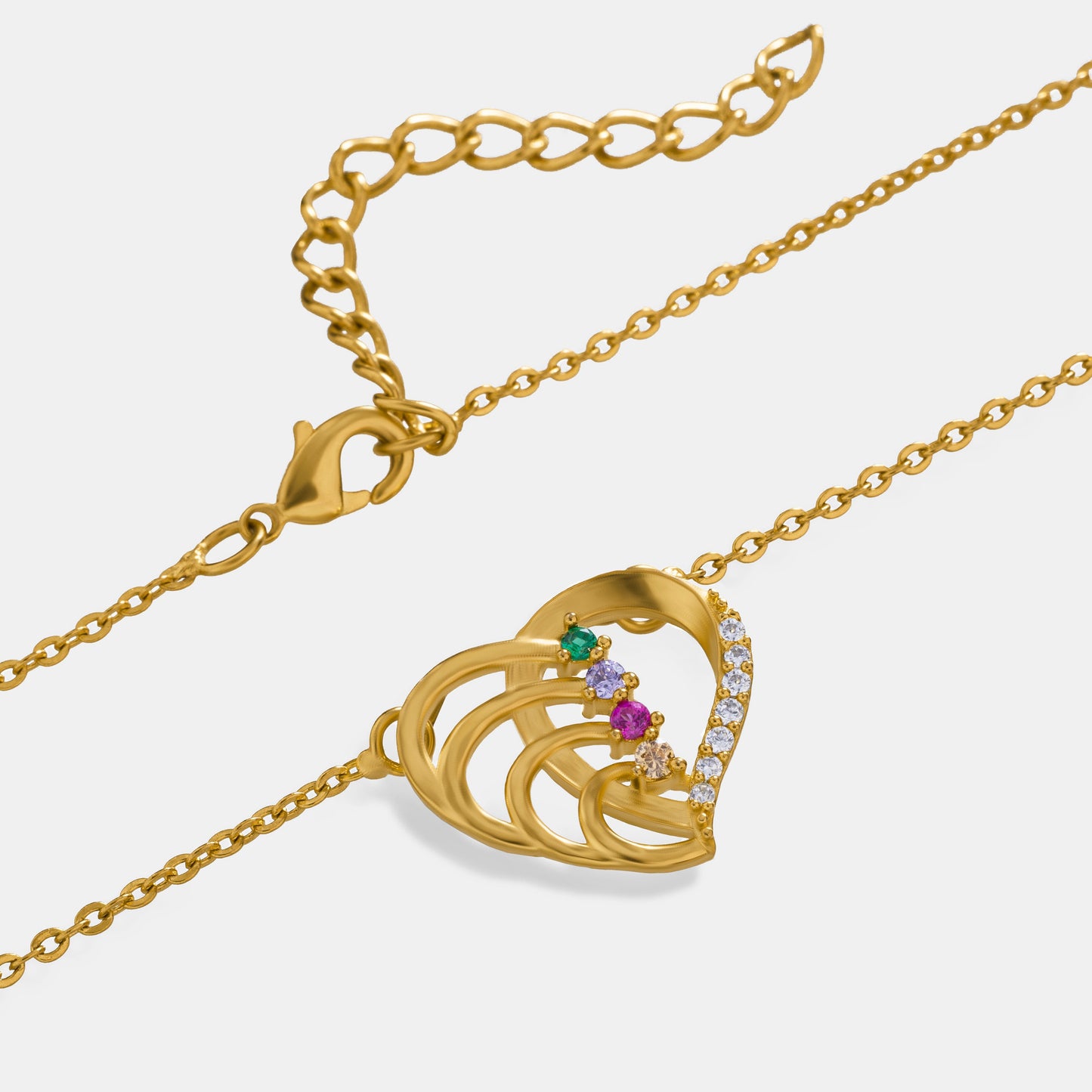 golden necklace with a diamond heart pendant