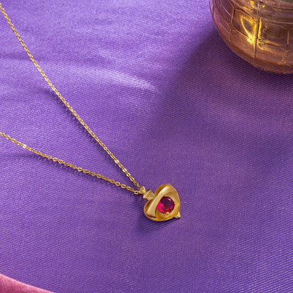 Golden Necklace with a Heart Shaped Pendant