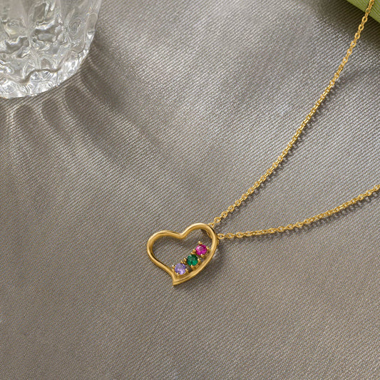 Golden Necklace with a Heart Pendant and a Rainbow Stone