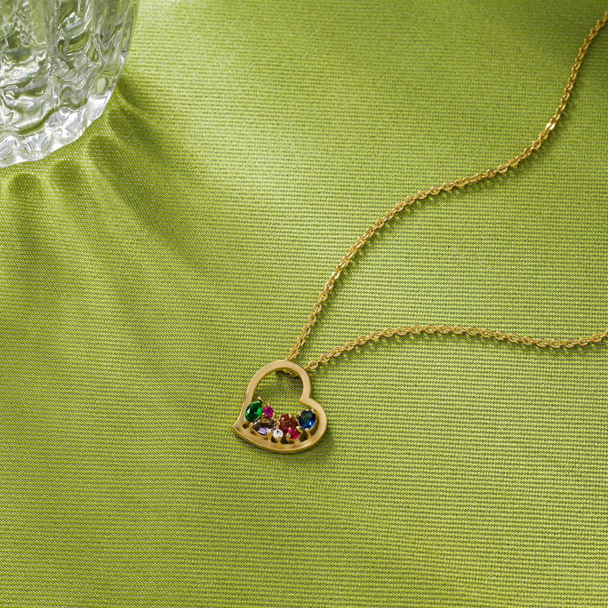 golden necklace with a heart pendant