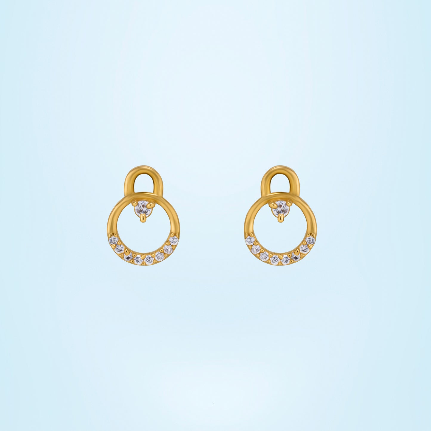 pair of golden earrings with diamonds