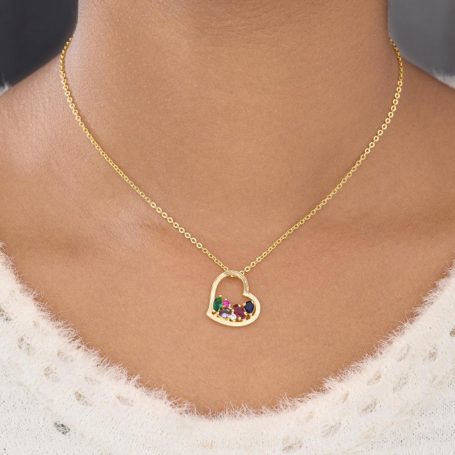 golden necklace with a heart pendant