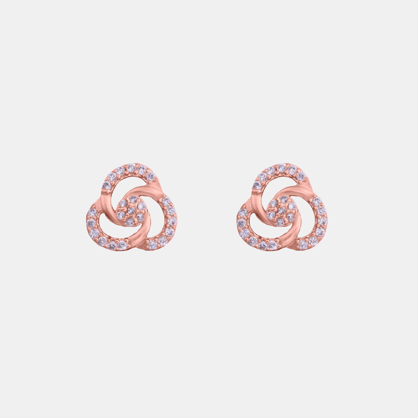 pair of rose gold and diamond earrings