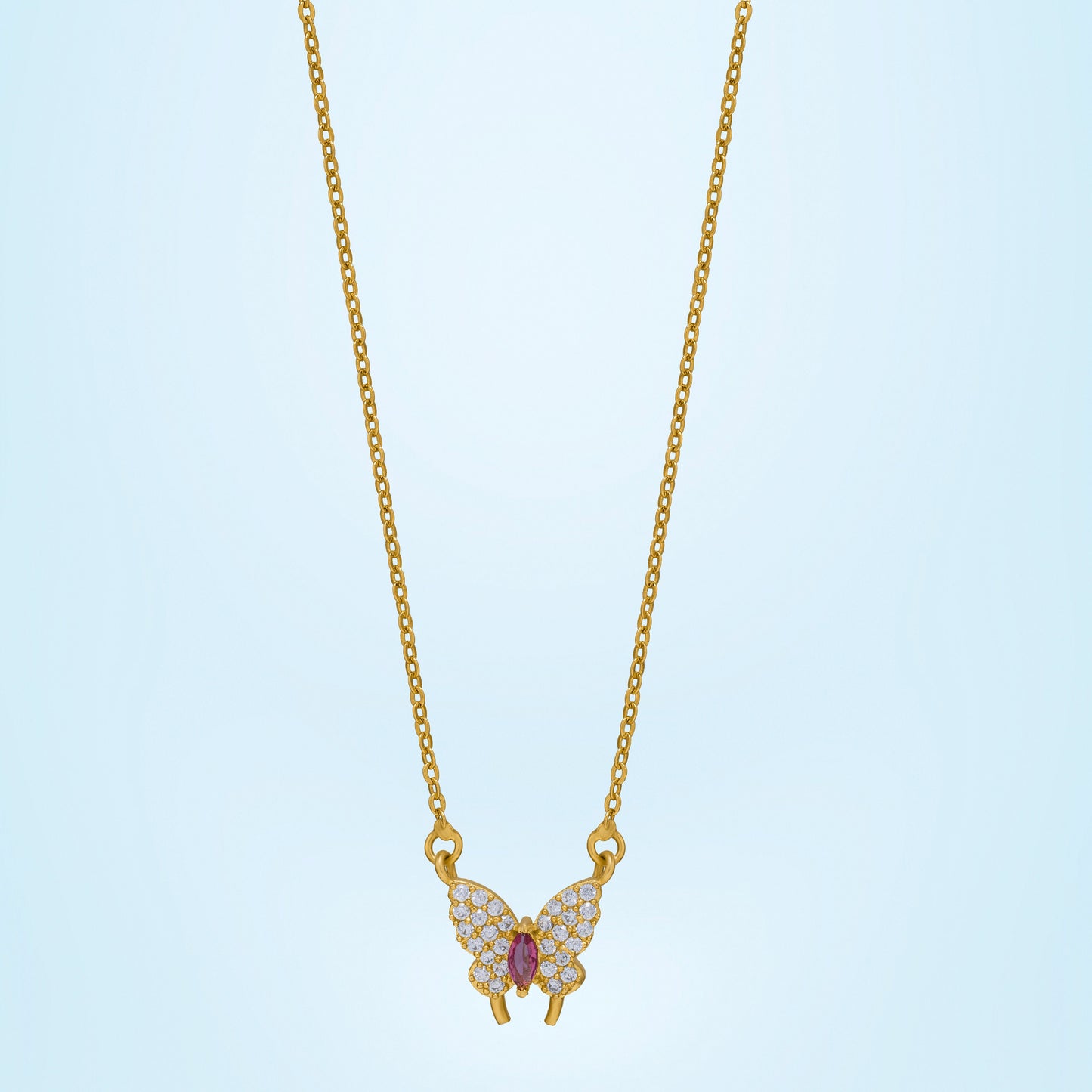 golden necklace with a butterfly pendant