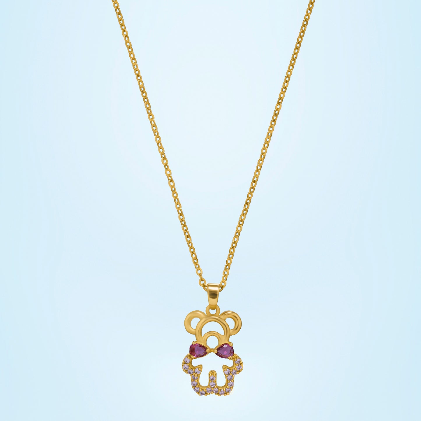 golden necklace with a heart and a diamond