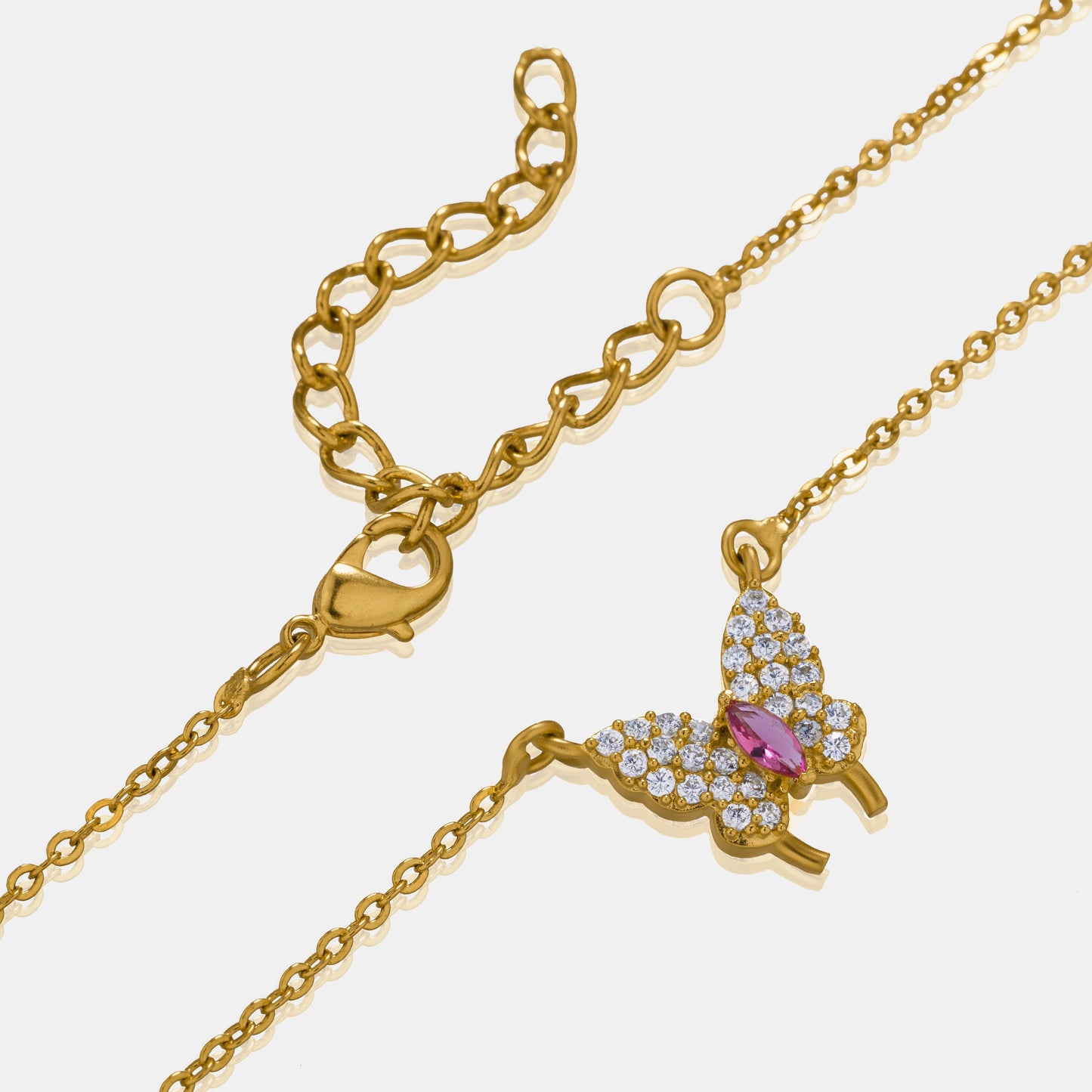 golden necklace with a butterfly pendant