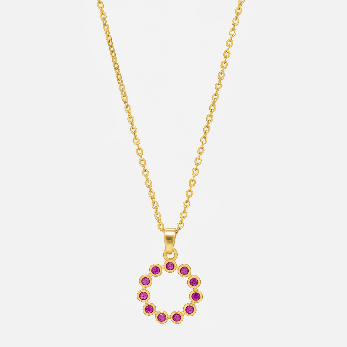 golden necklace with a purple stone pendant