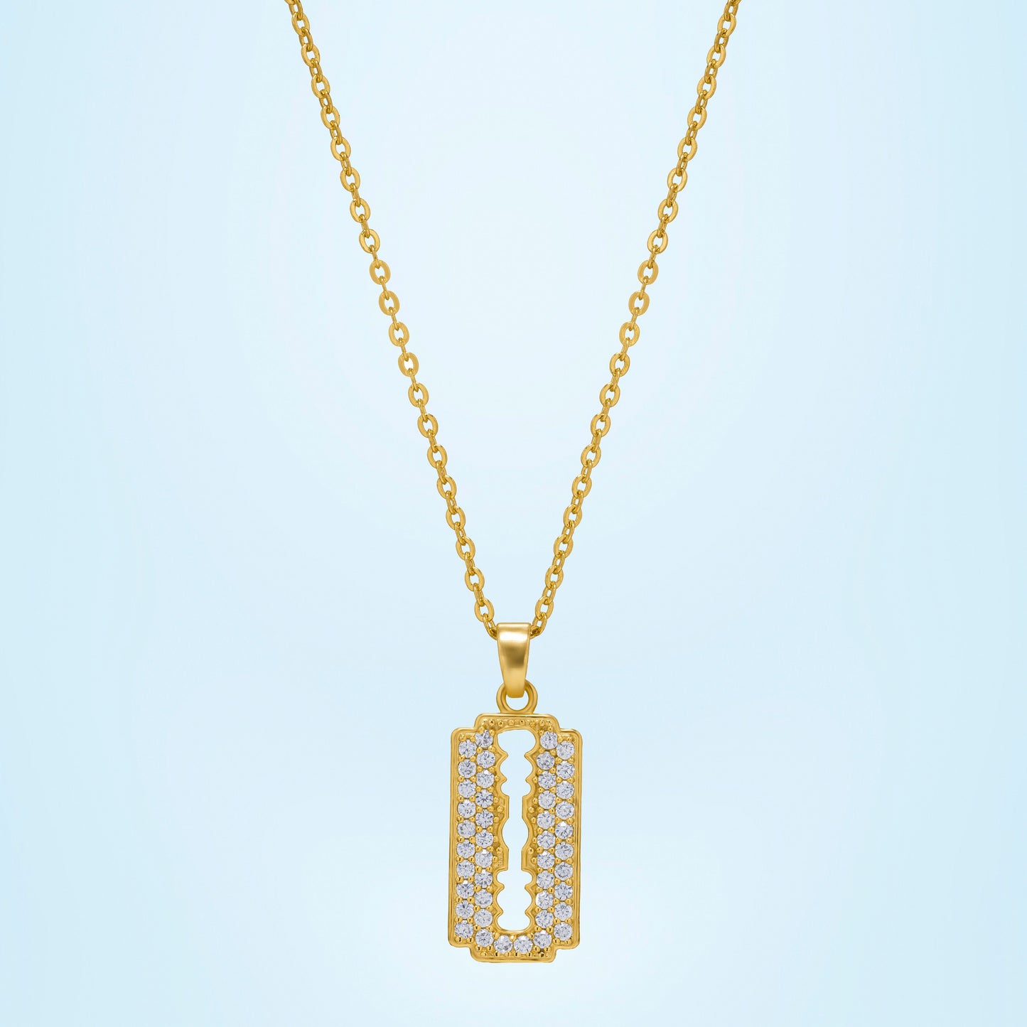 golden necklace with a diamond bar pendant