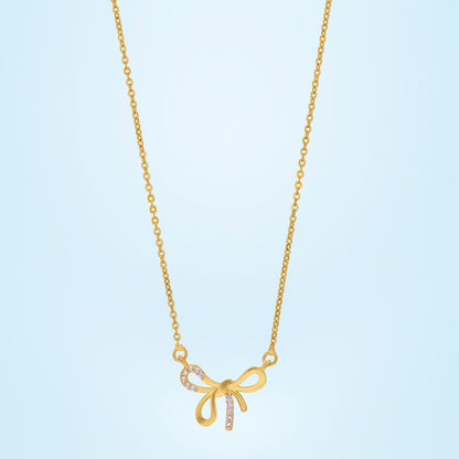 Golden Necklace with a Bow and a Diamond