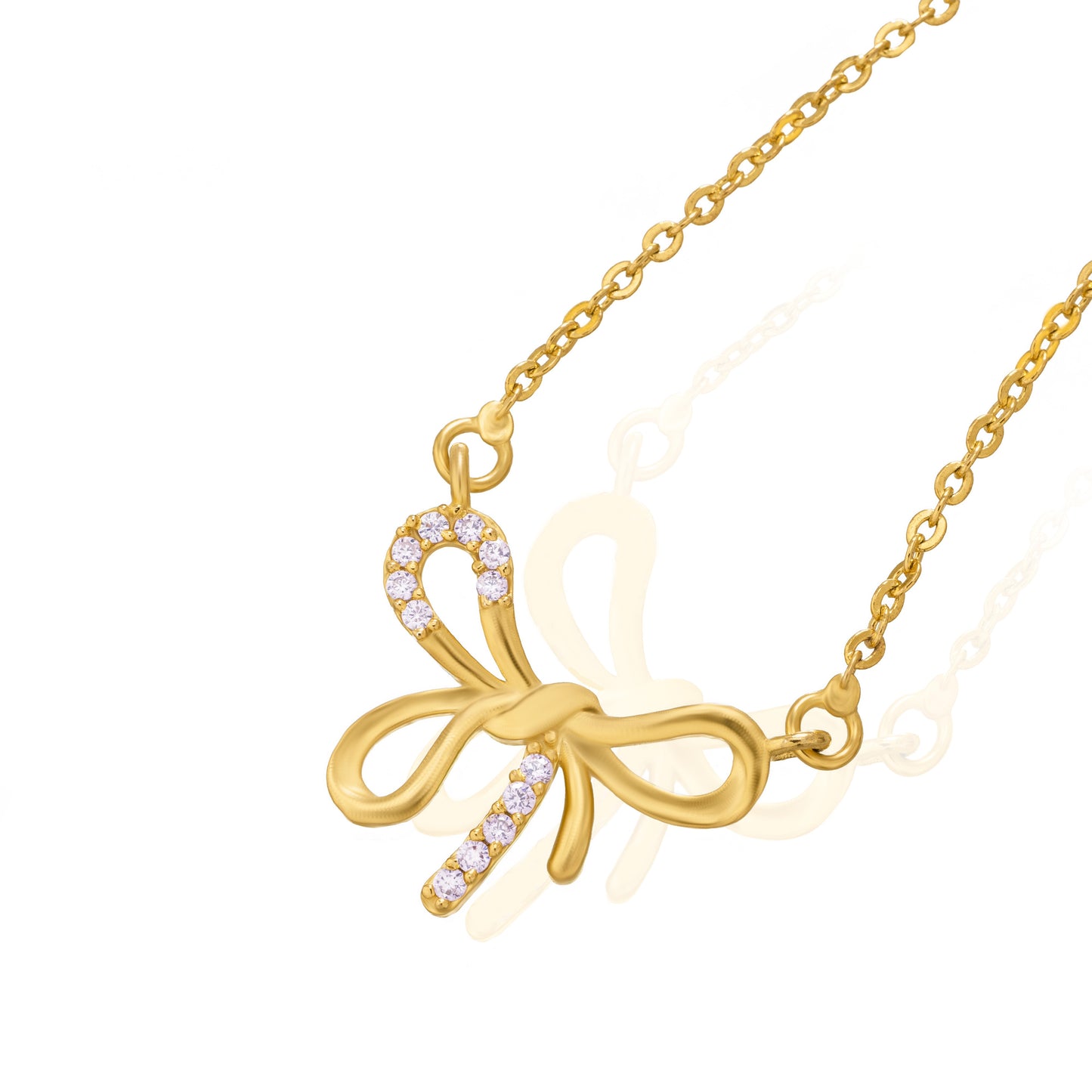 golden necklace with a bow and a diamond