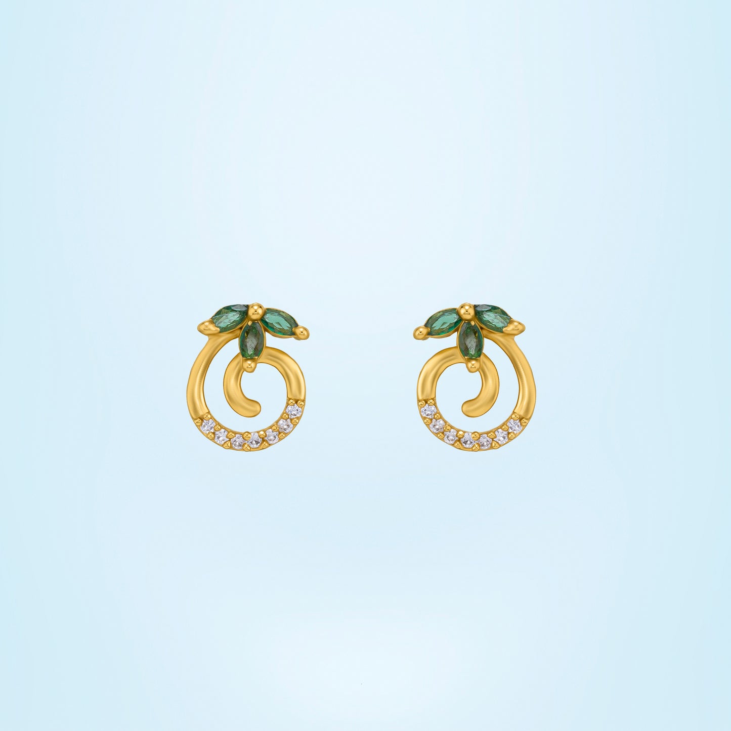 pair of golden earrings with emerald and diamonds