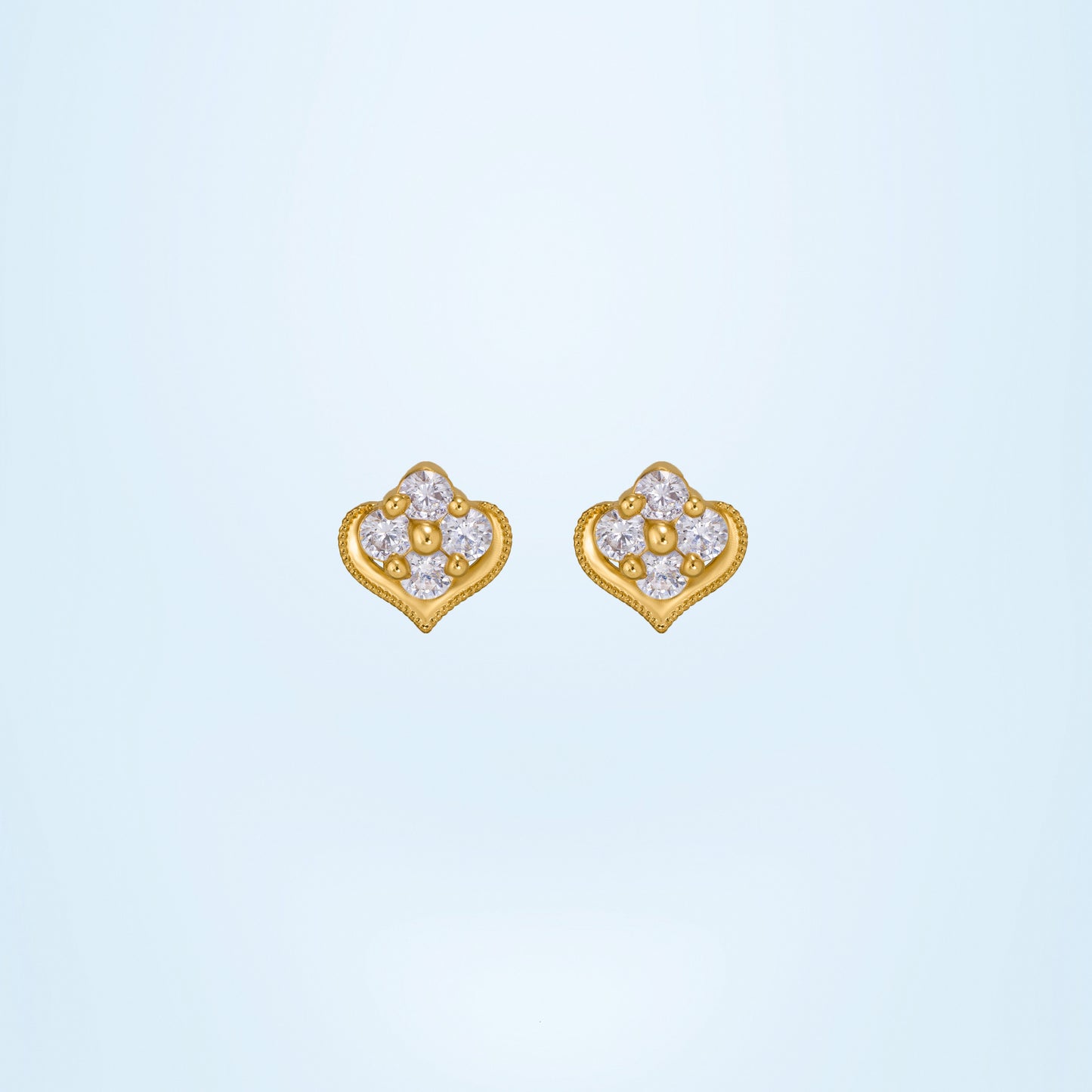 pair of golden earrings with diamonds