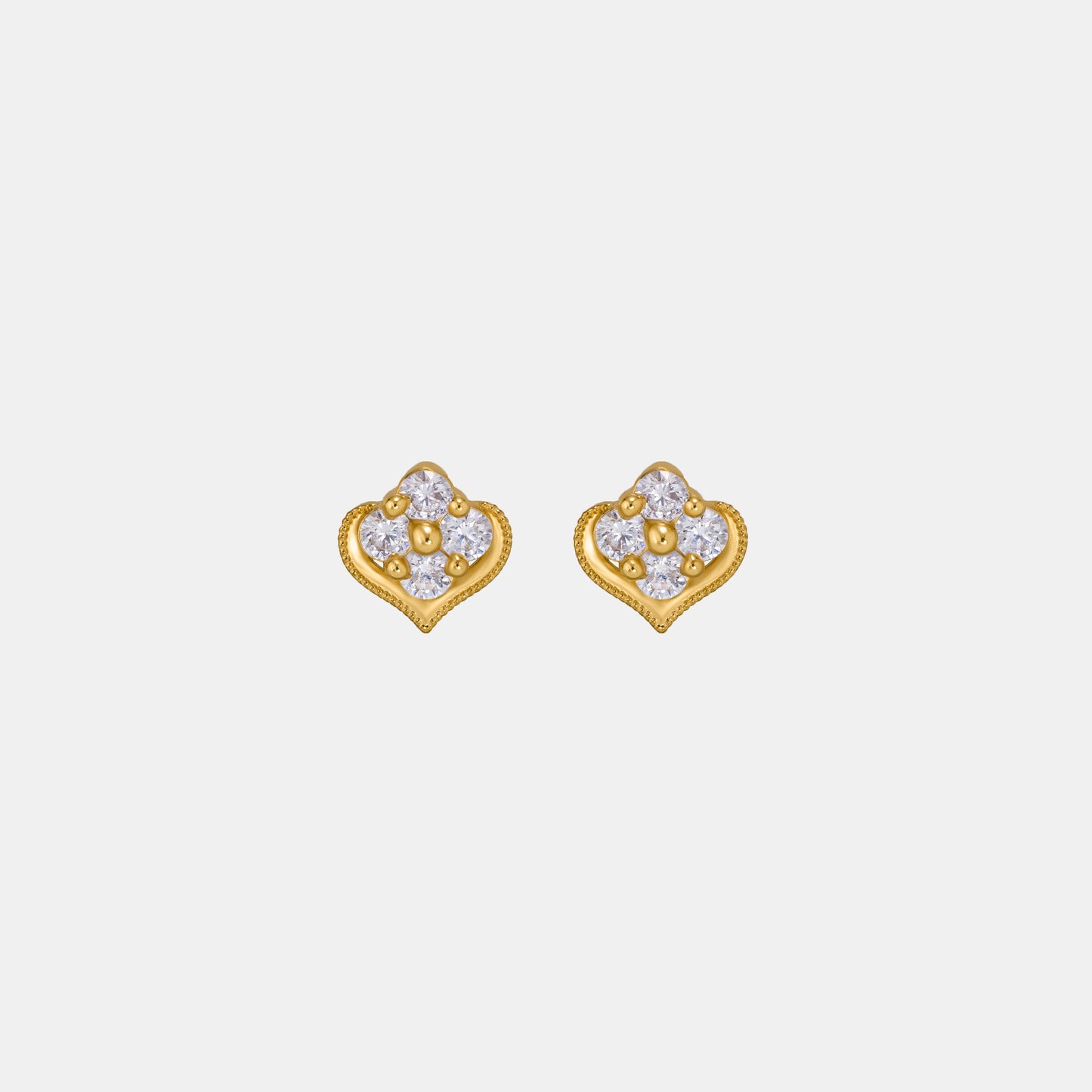 pair of golden earrings with diamonds