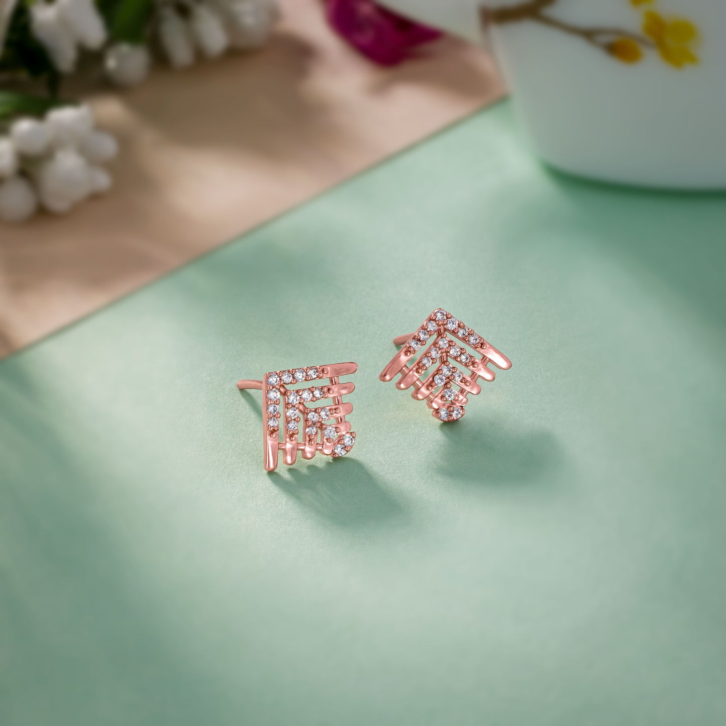 the rose gold earrings with diamonds