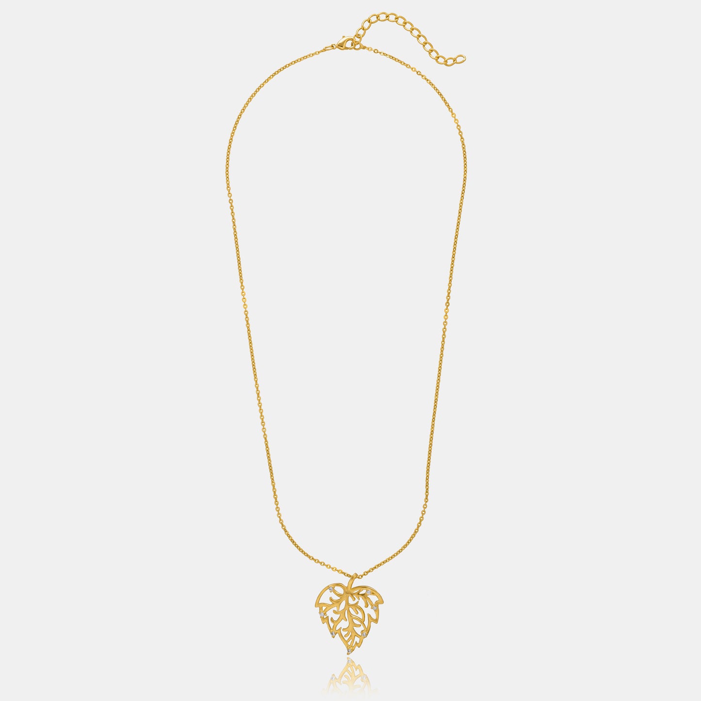 golden necklace with a leaf design on it