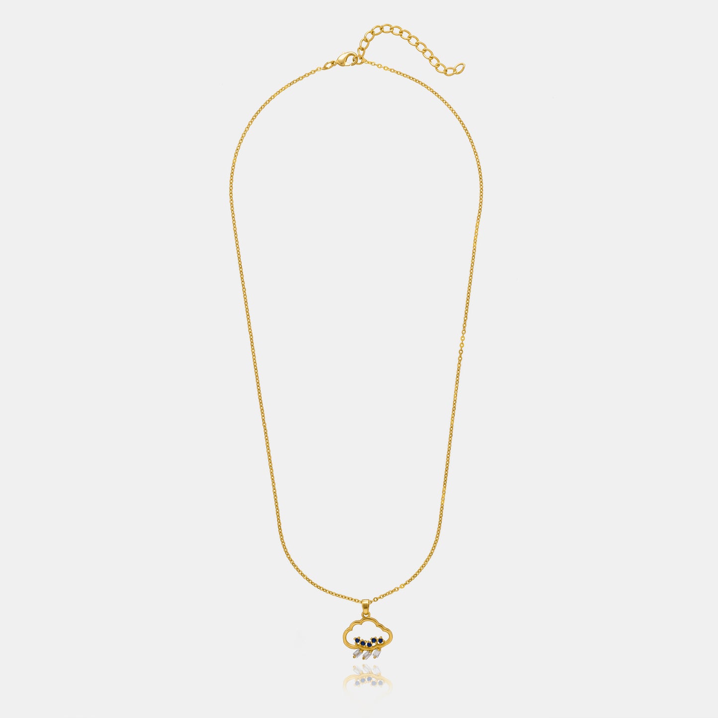 golden necklace with a heart pendant and a small diamond