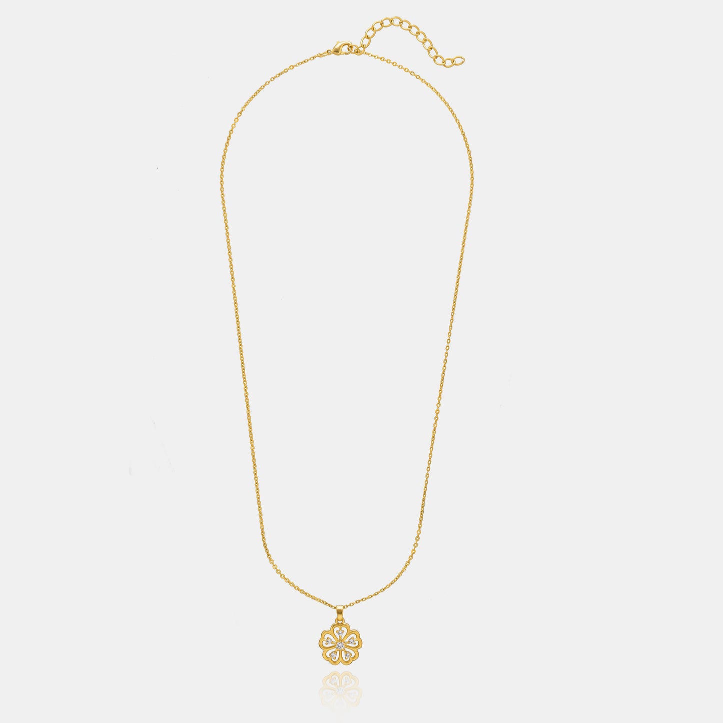 golden necklace with a clover design