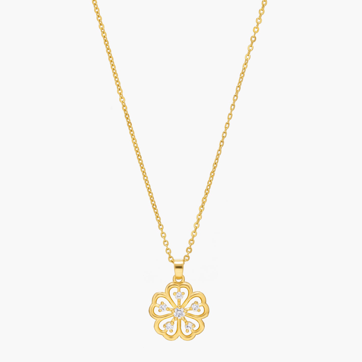 golden necklace with a clover design