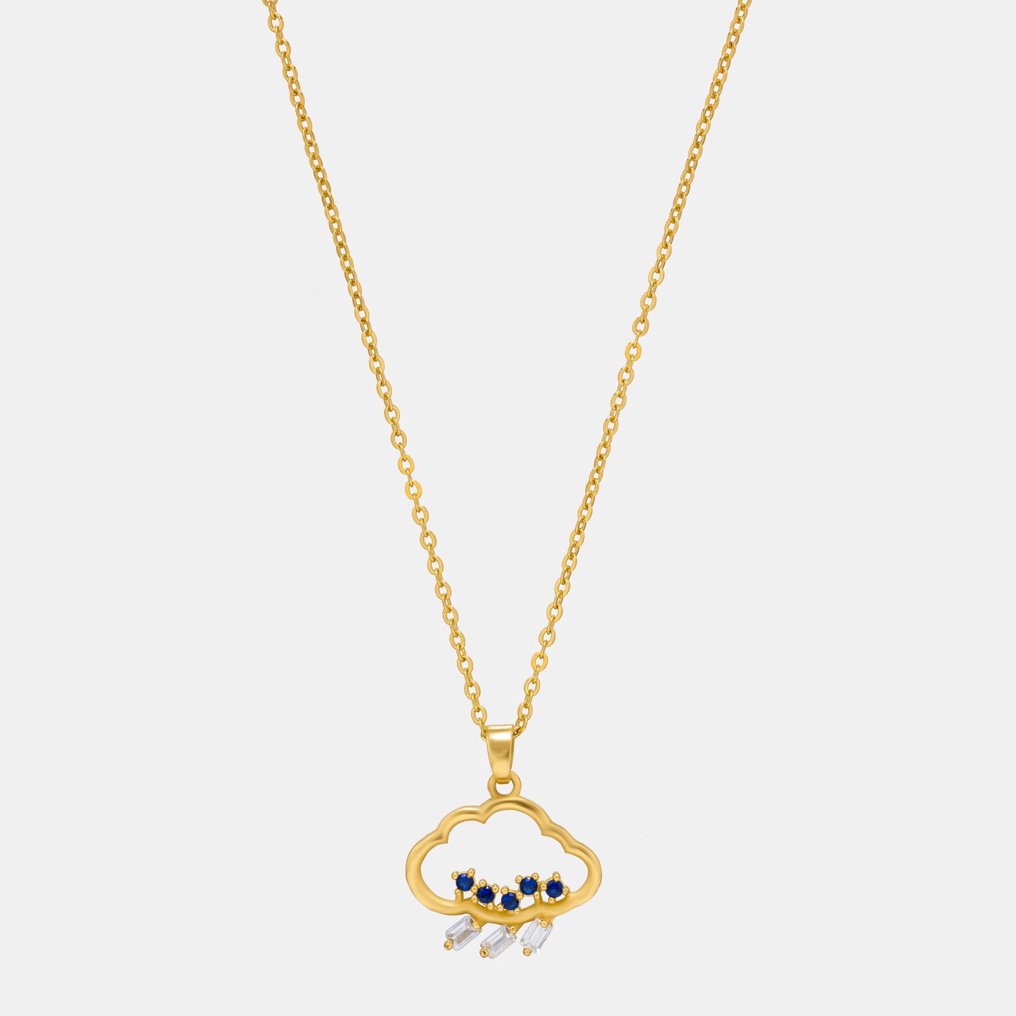 golden necklace with a heart pendant and a small diamond