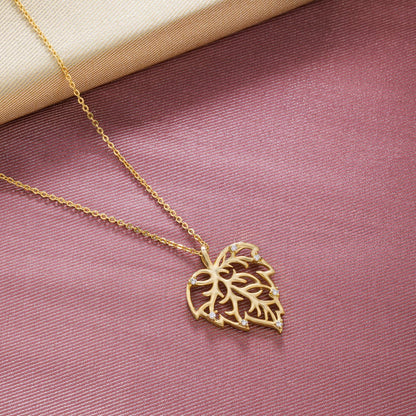 Golden Necklace with a Leaf Design on it