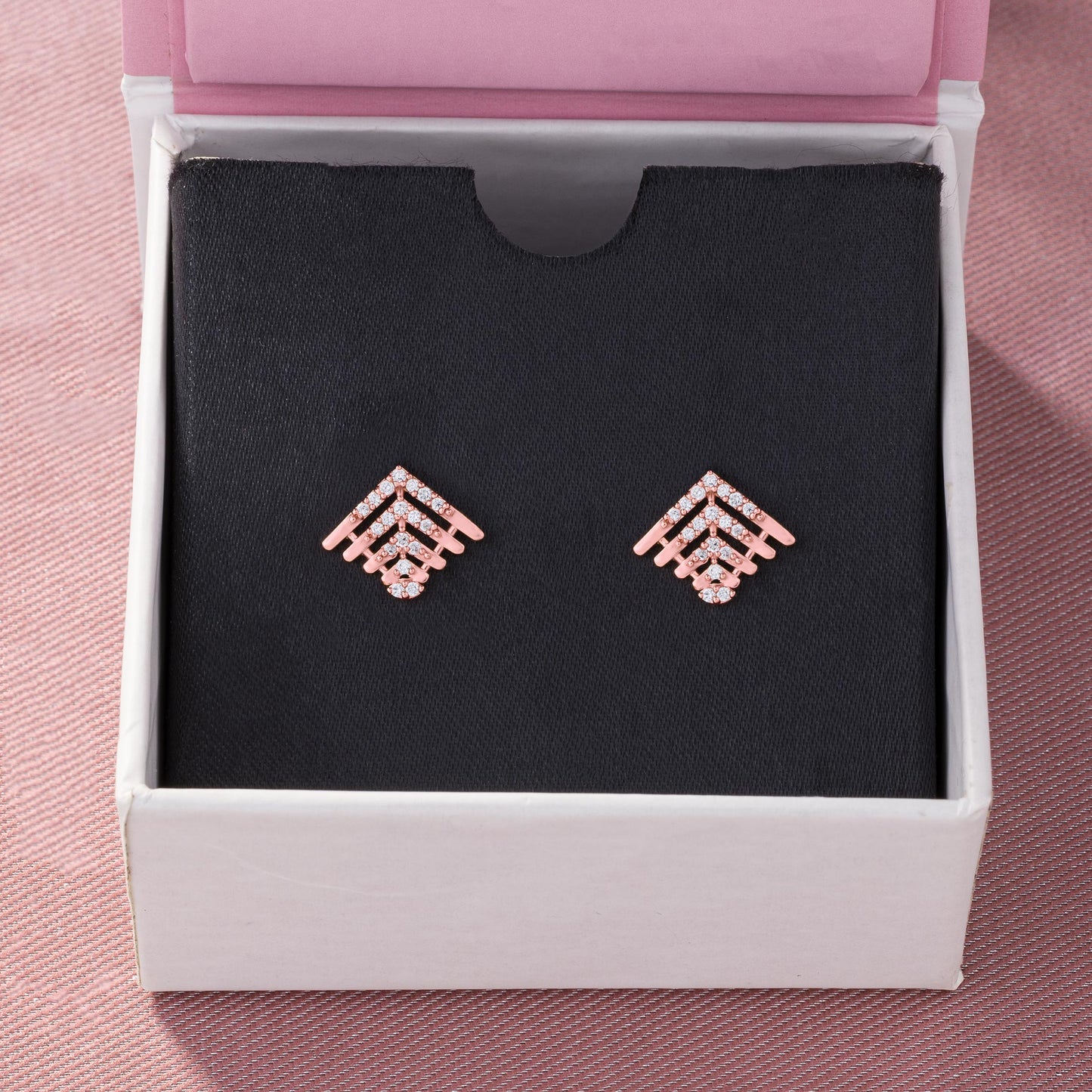 the rose gold earrings with diamonds