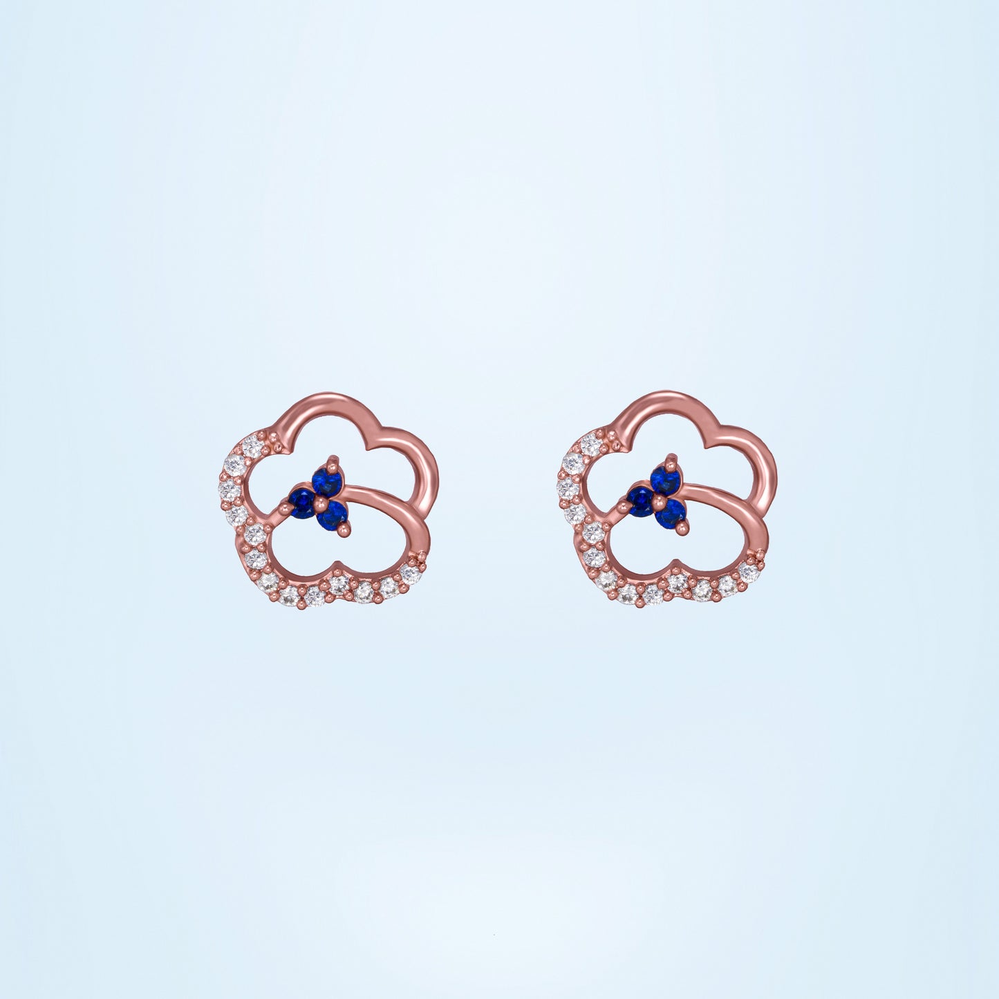 pair of gold rose earrings with blue sapphire and diamonds