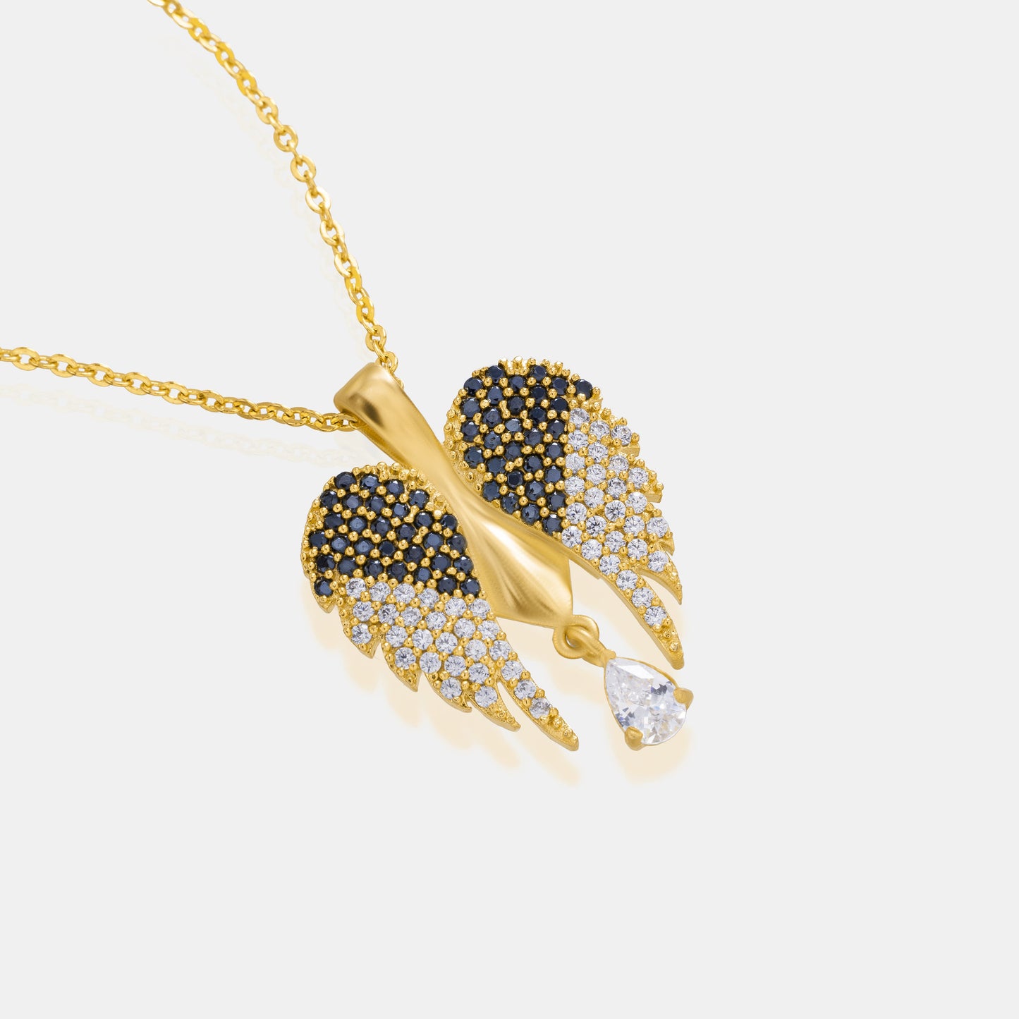 golden necklace with a diamond angel wing pendant