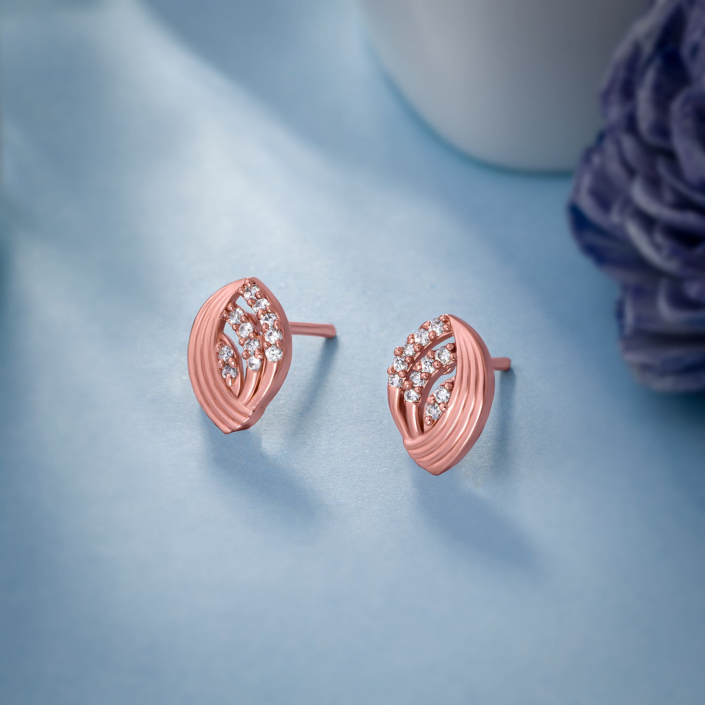 elegant rose gold earrings adorned with shimmering diamonds