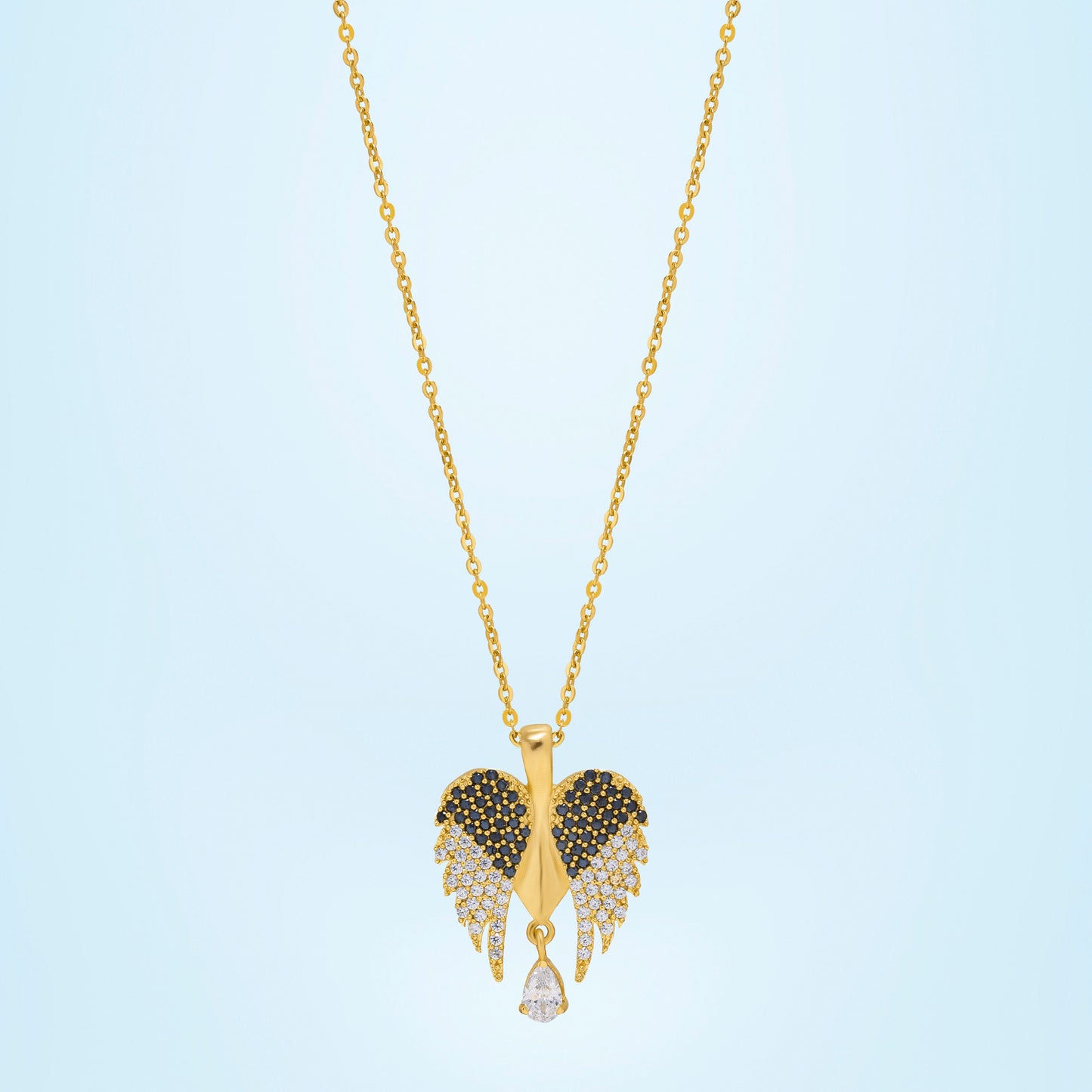 golden necklace with a diamond angel wing pendant