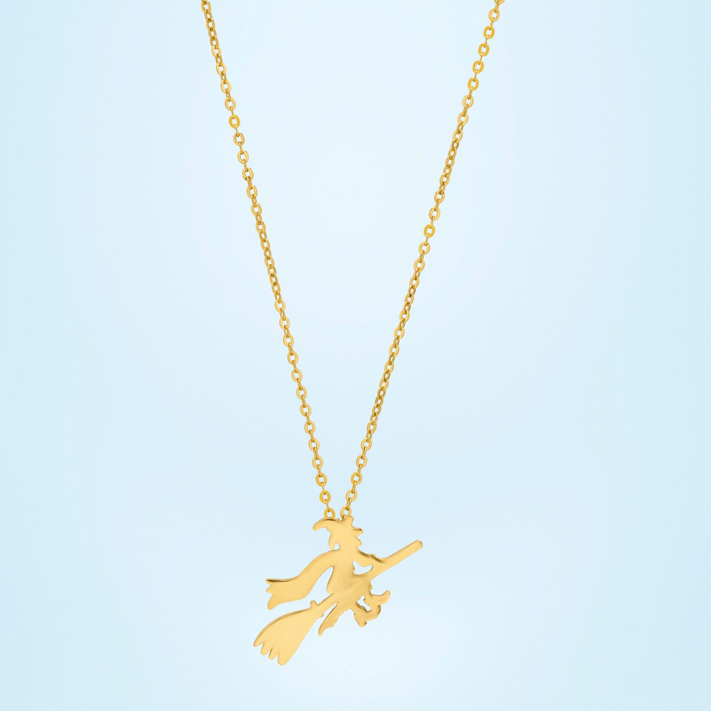 channeling your inner witch with this magical golden necklace