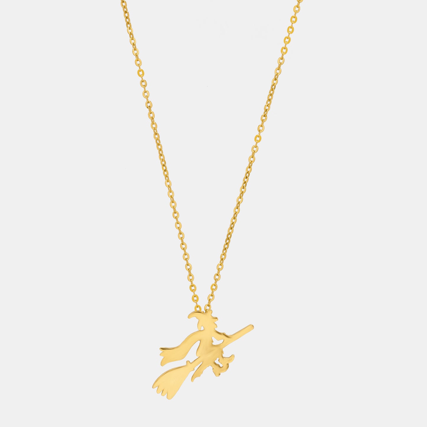 channeling your inner witch with this magical golden necklace