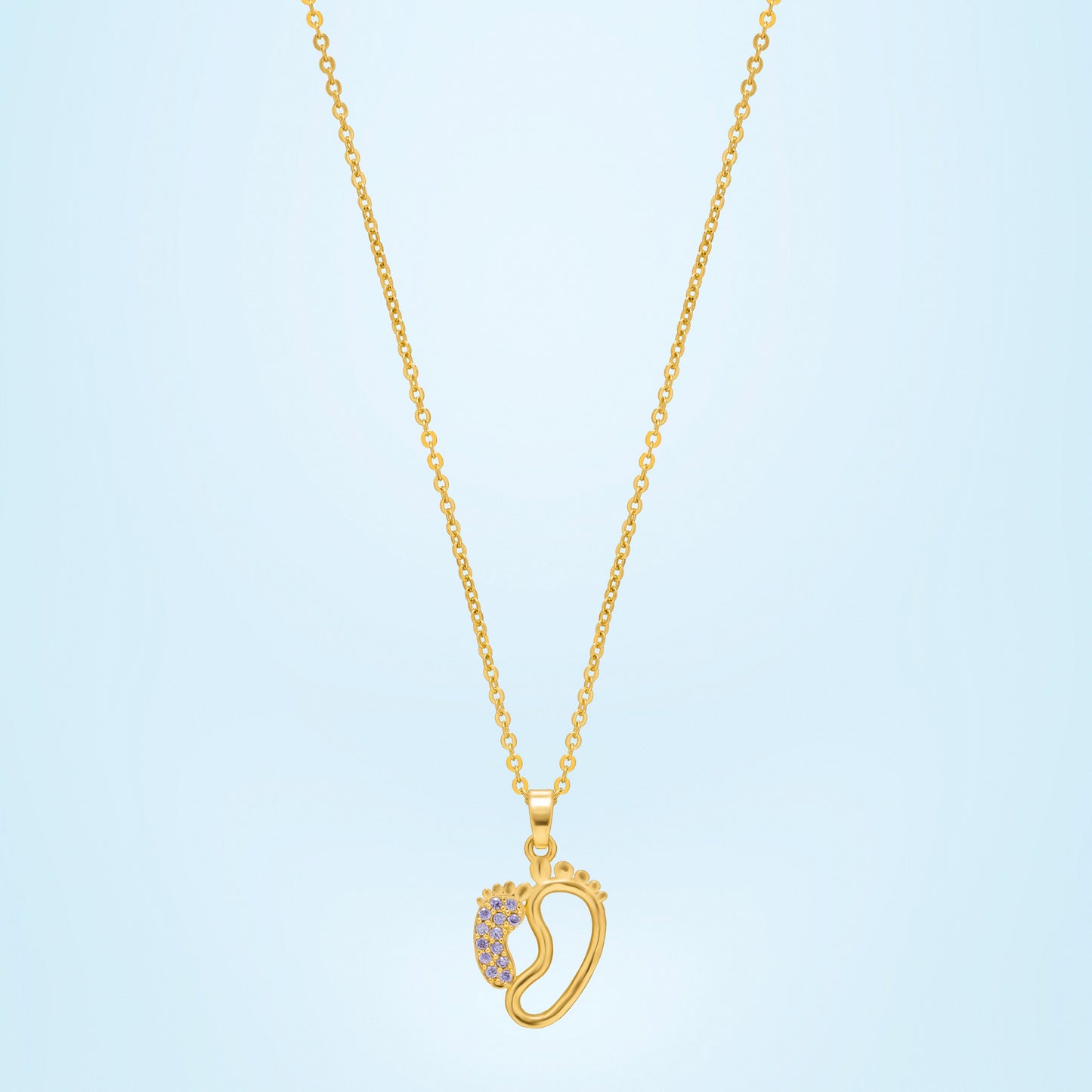 golden necklace with a diamond pendant