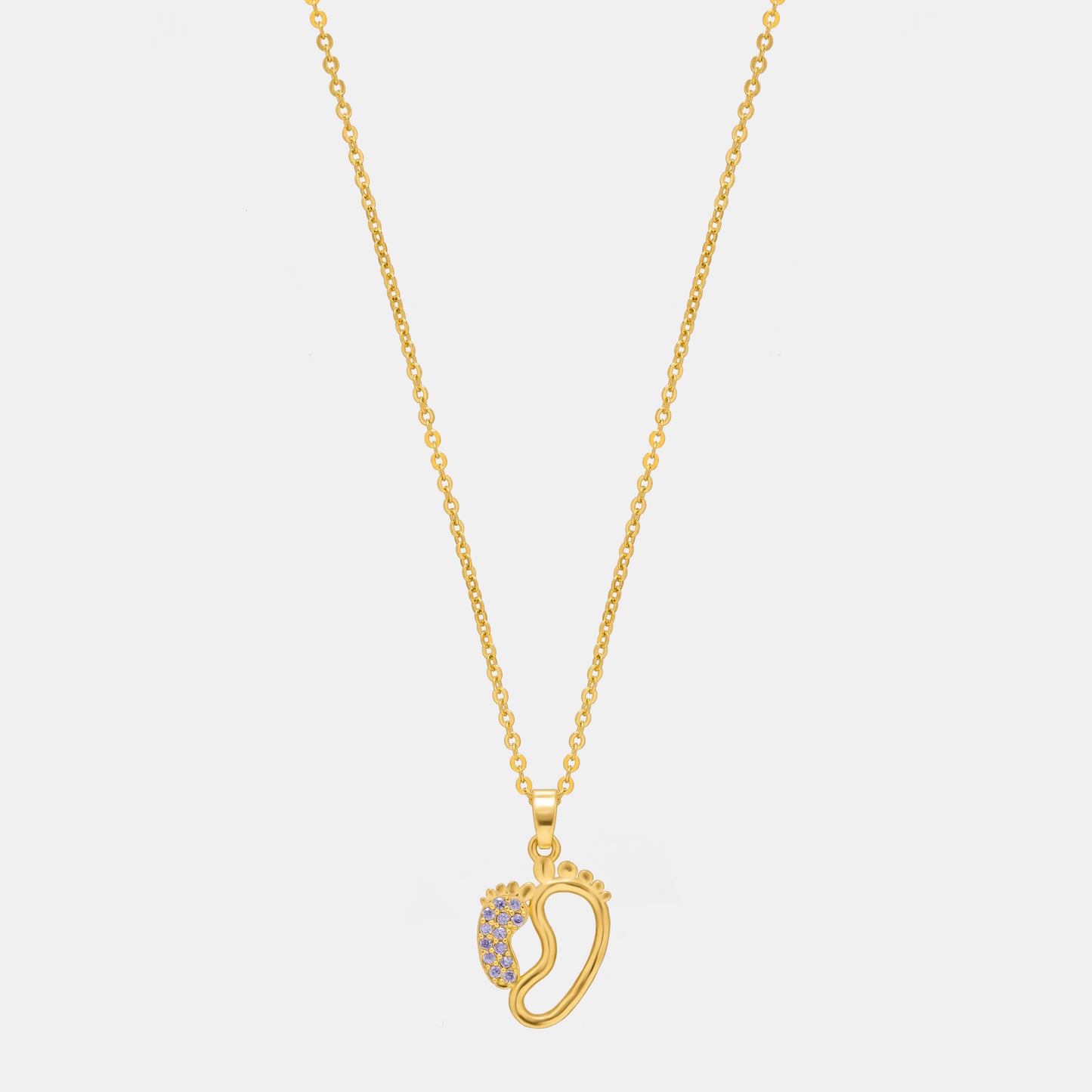 golden necklace with a diamond pendant