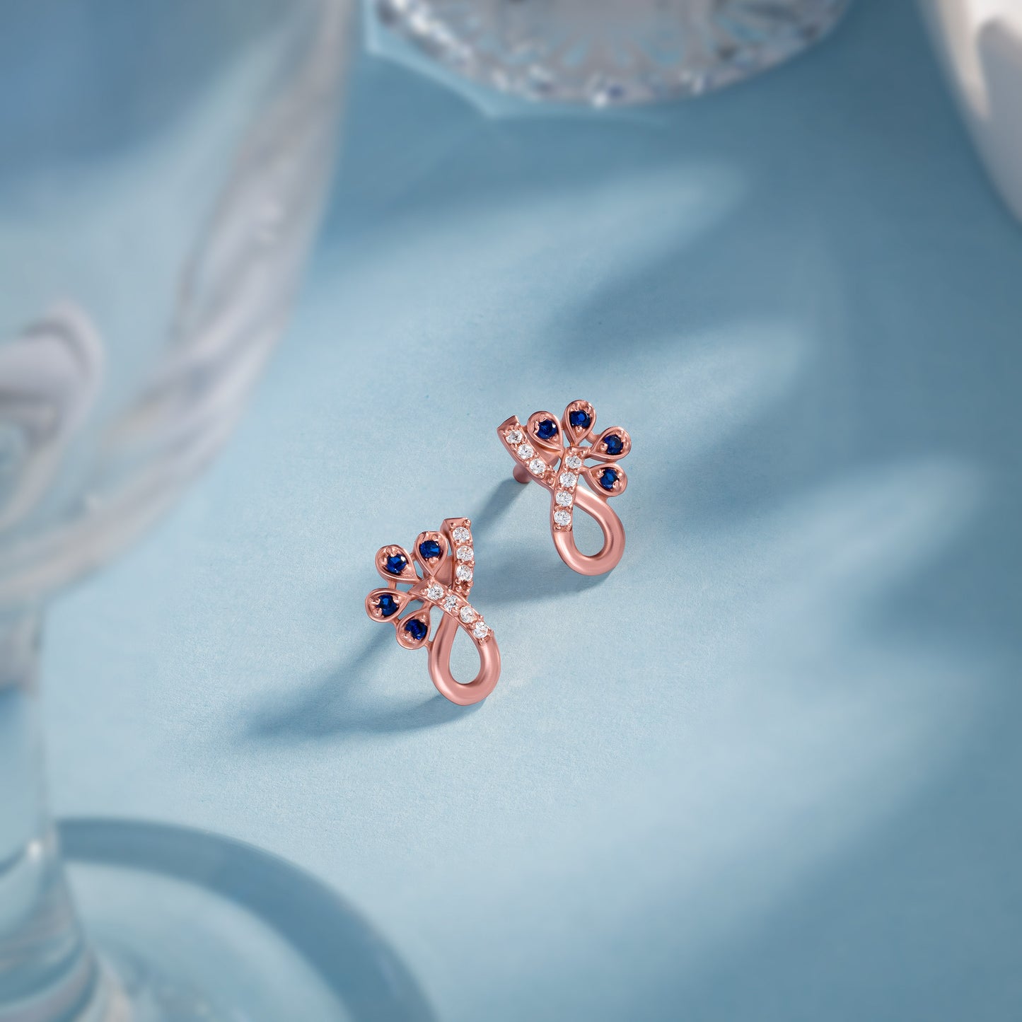 rose gold plated blue cz stud earrings