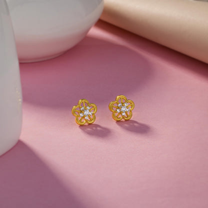 Pair of Golden Earrings with a Flower Design