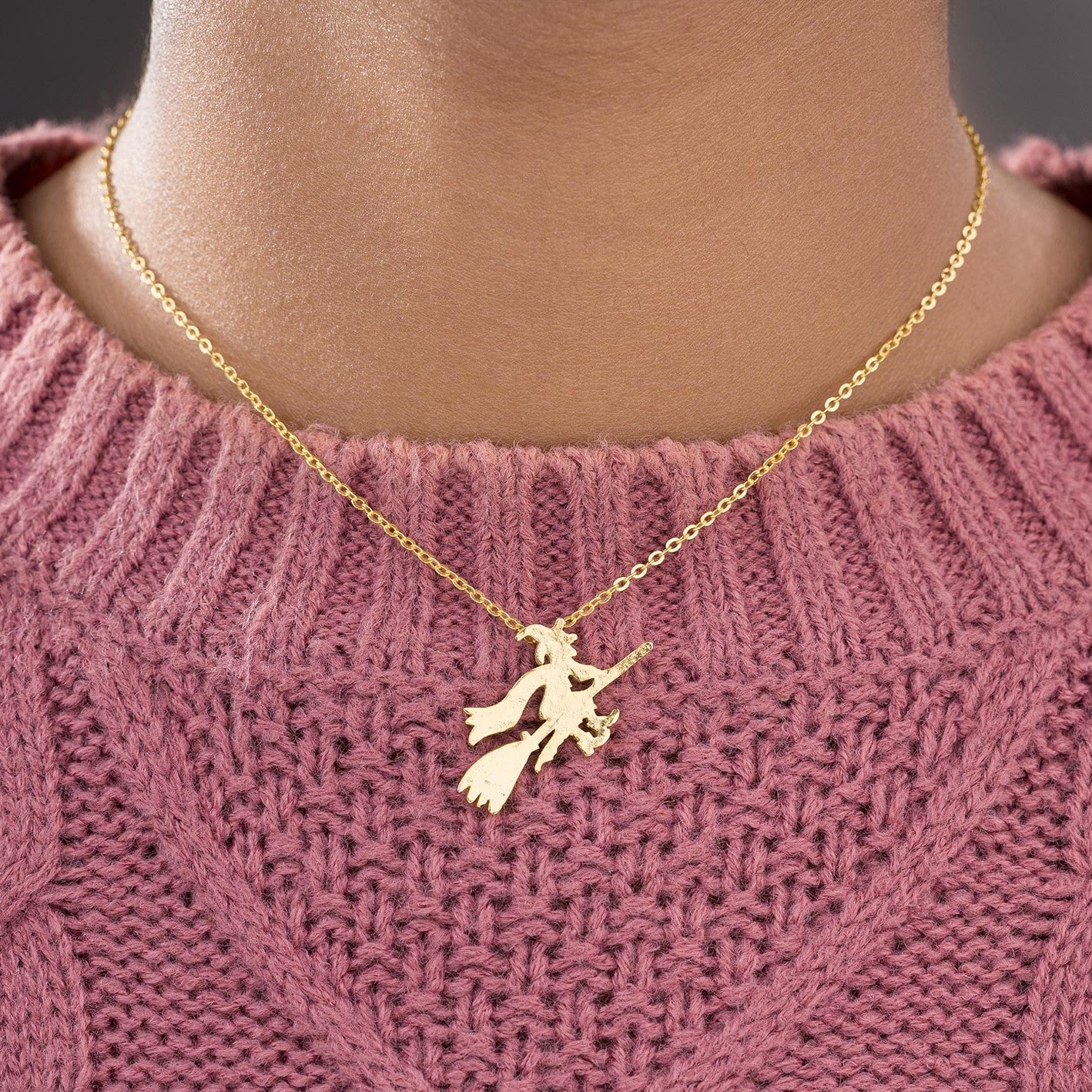 channeling your inner witch with this magical golden necklace