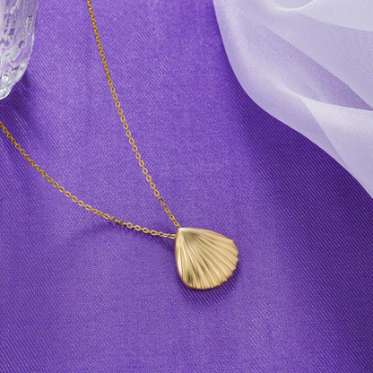 Golden Necklace with a Shell on it