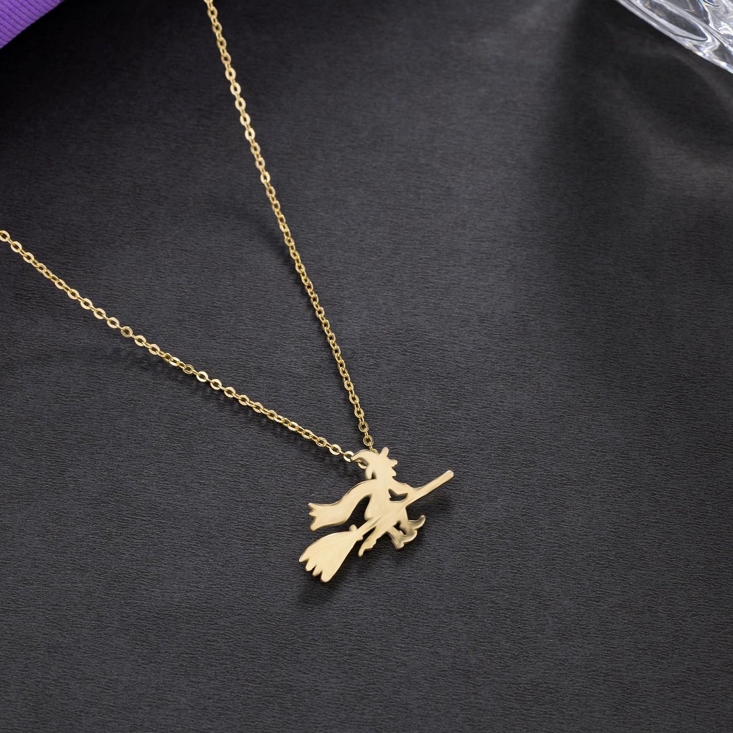 channeling your inner witch with this magical golden necklace