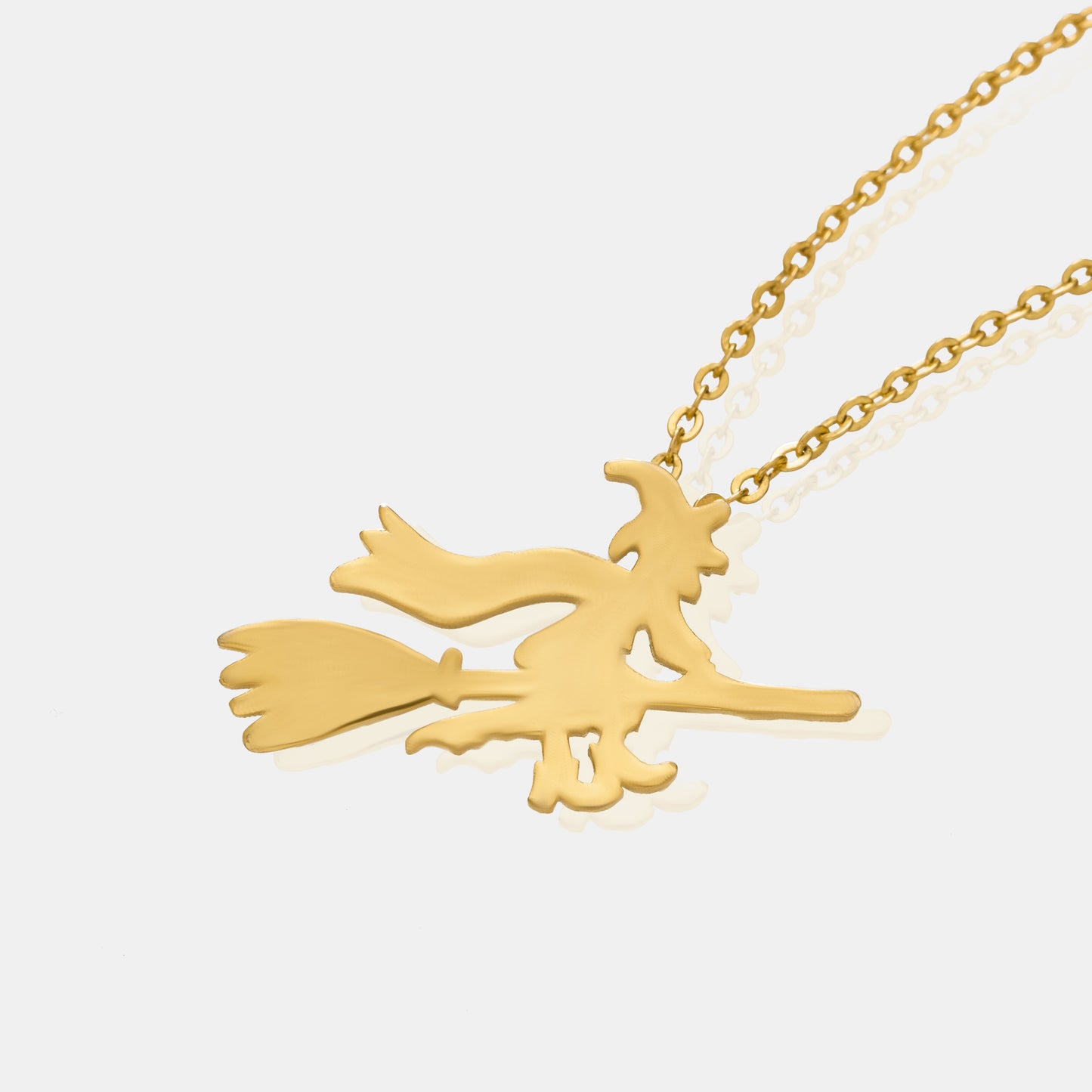 channeling your inner witch with this magical golden necklace