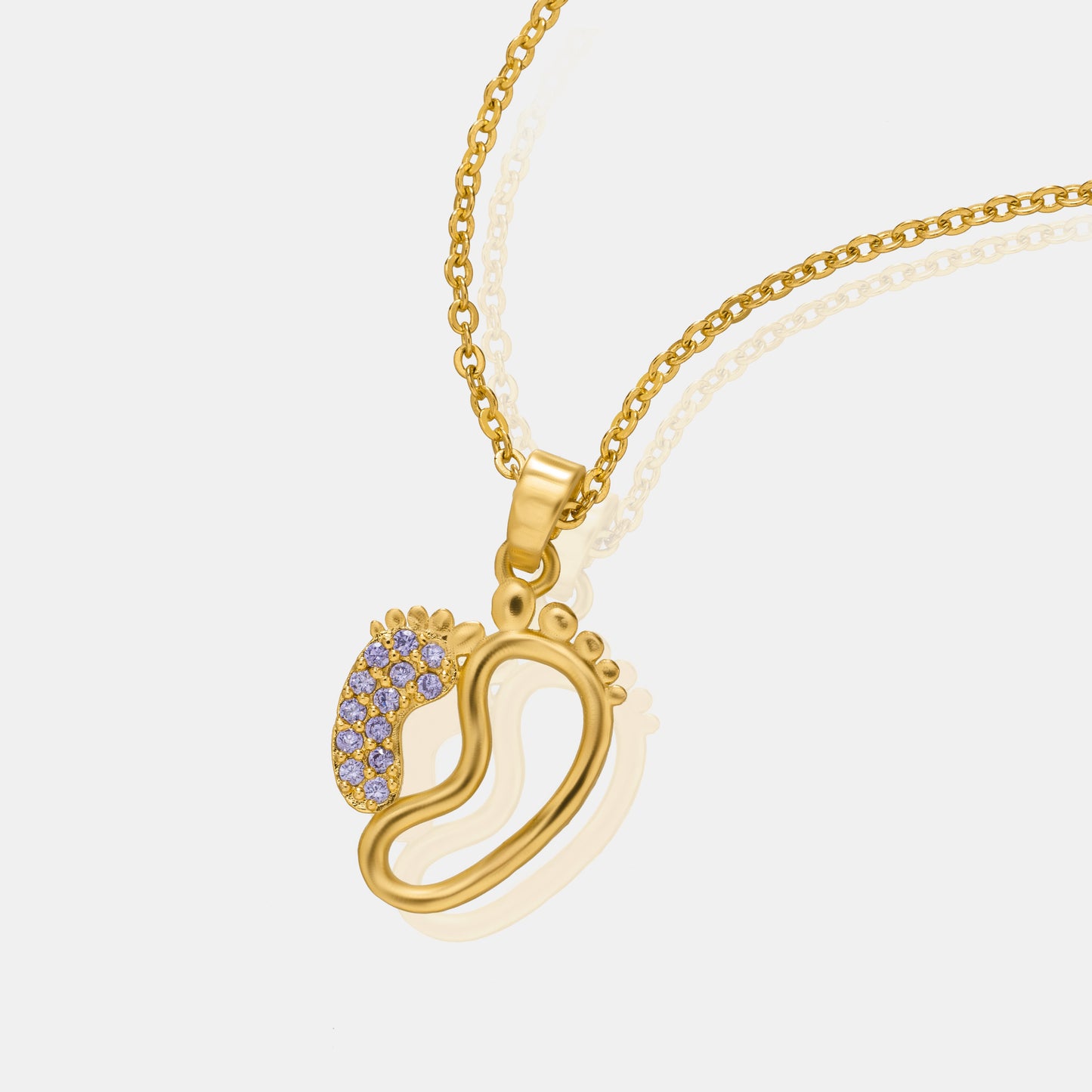 golden necklace with a diamond pendant