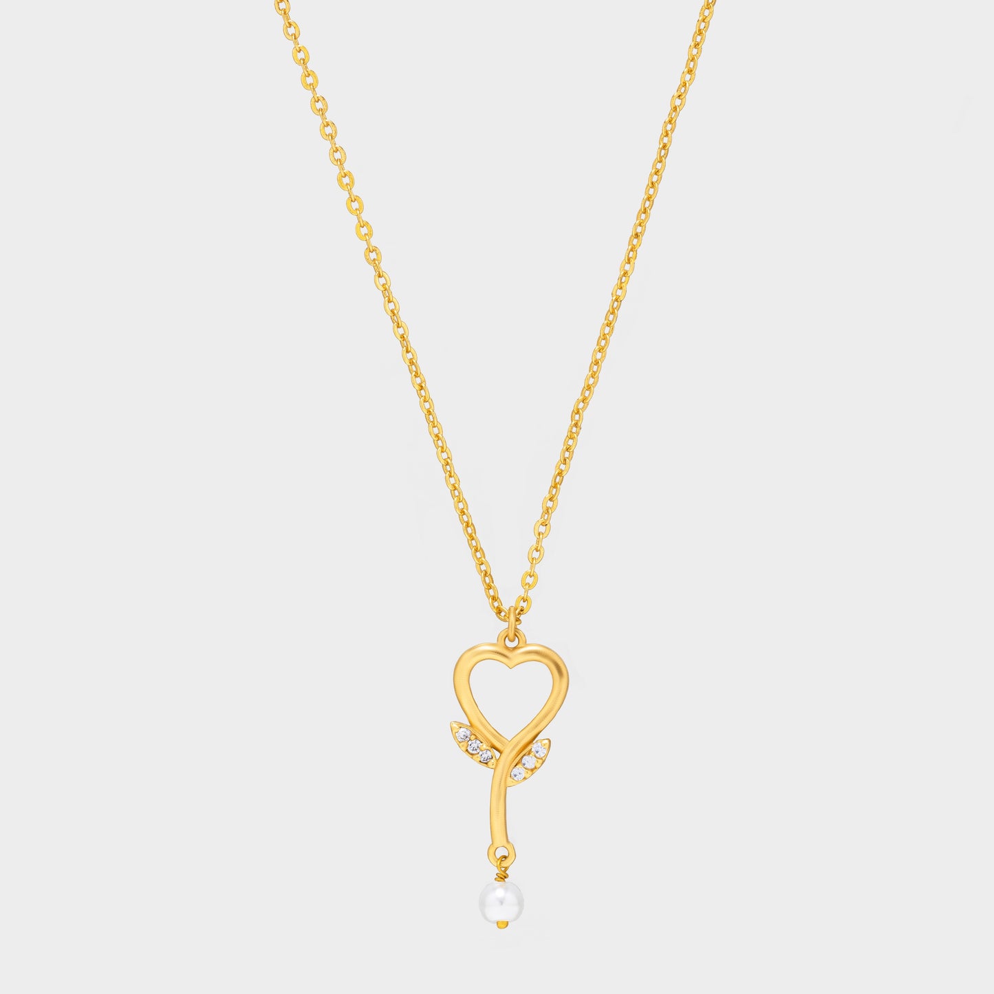 golden necklace with  diamond heart pendant