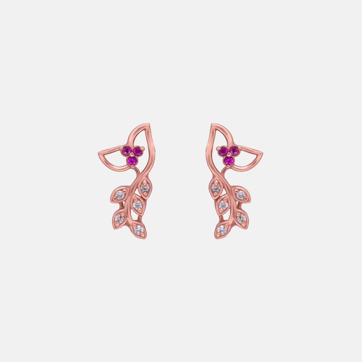 pair of rose gold earrings with diamonds