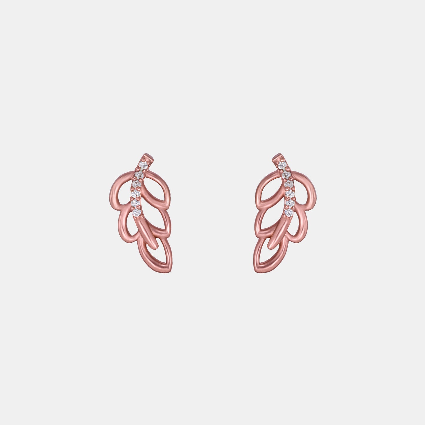 pair of rose gold earrings with a single diamond