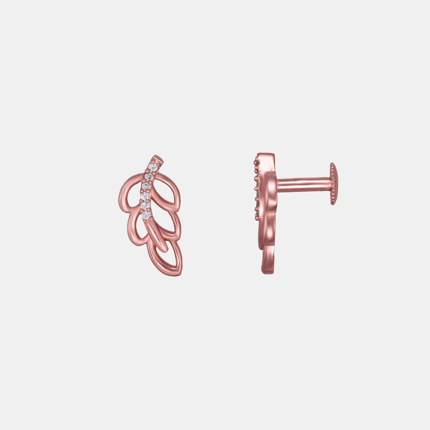 pair of rose gold earrings with a single diamond